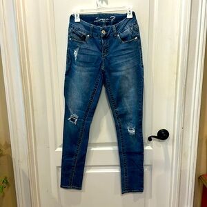 Seven 7 whiskered, distressed size 4 stretch jeans